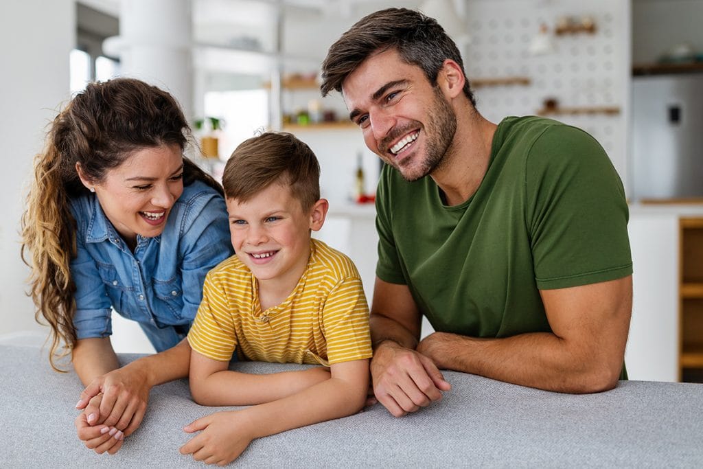 Happy family smiling. Immun-A-TEA survey shows positive family health and wellness results in June 2021.