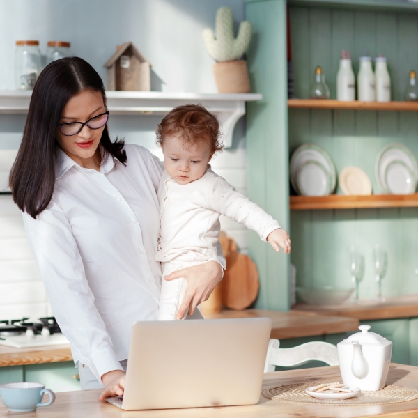 Young mother works at home with a laptop with a baby in her arms, remote work on maternity leave essential oils for depression, Essential oils for headaches, Essential oils for removing ticks, Essential oils for infection, Essential oils for toothaches, Essential oils anxiety, Infant eczema, Baby eczema, Brain mapping, Neurofeedback, Reprogramming the brain, Natural substances for depression, Natural substances for anxiety, Alternative medicine, Complementary medicine